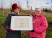 The Lord-Lieutenant, Lady Redmond MBE, presenting a QGC plaque to the Sheriff of Chester, Cllr Jill Houlbrook